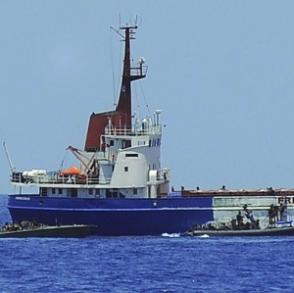Click on image to see full-sized version MV Rachel Corrie being boarded by Israeli Navy