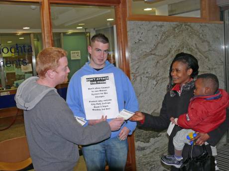 Click on image to see full-sized version This Angolan woman gave a full and fair ear to these Sinn Fein activists